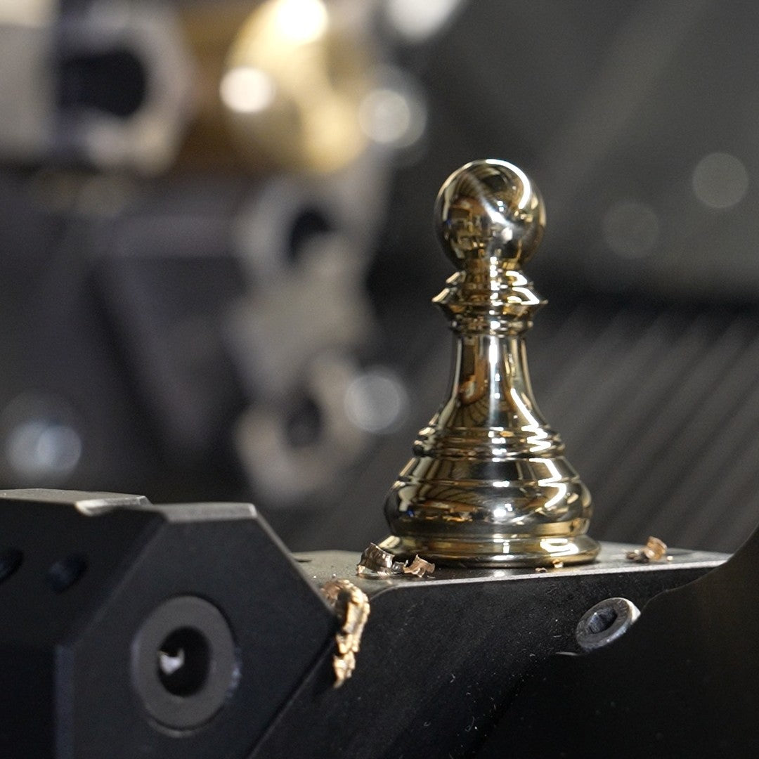 Brass chess pawn made on the SineCore SC-512L desktop CNC lathe